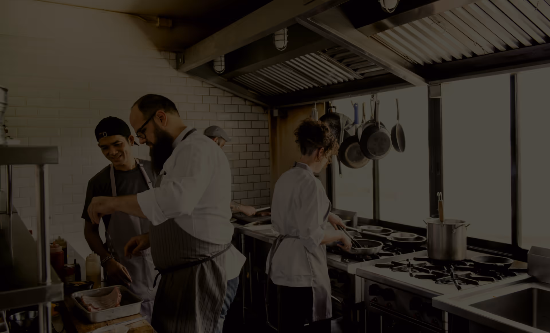 People working in a commercial kitchen